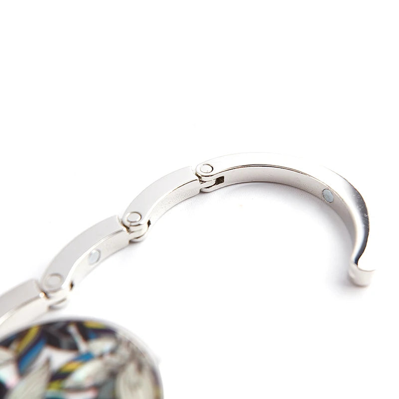 PORTABLE FOLDING BAG HANGER FOR TABLES